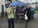 John Brier, KG4AKV, and Paul Stoetzer, N8HM (seated at the computer) work an SO-50 satellite pass at the AMSAT demonstration booth at the 2017 Dayton Hamvention.